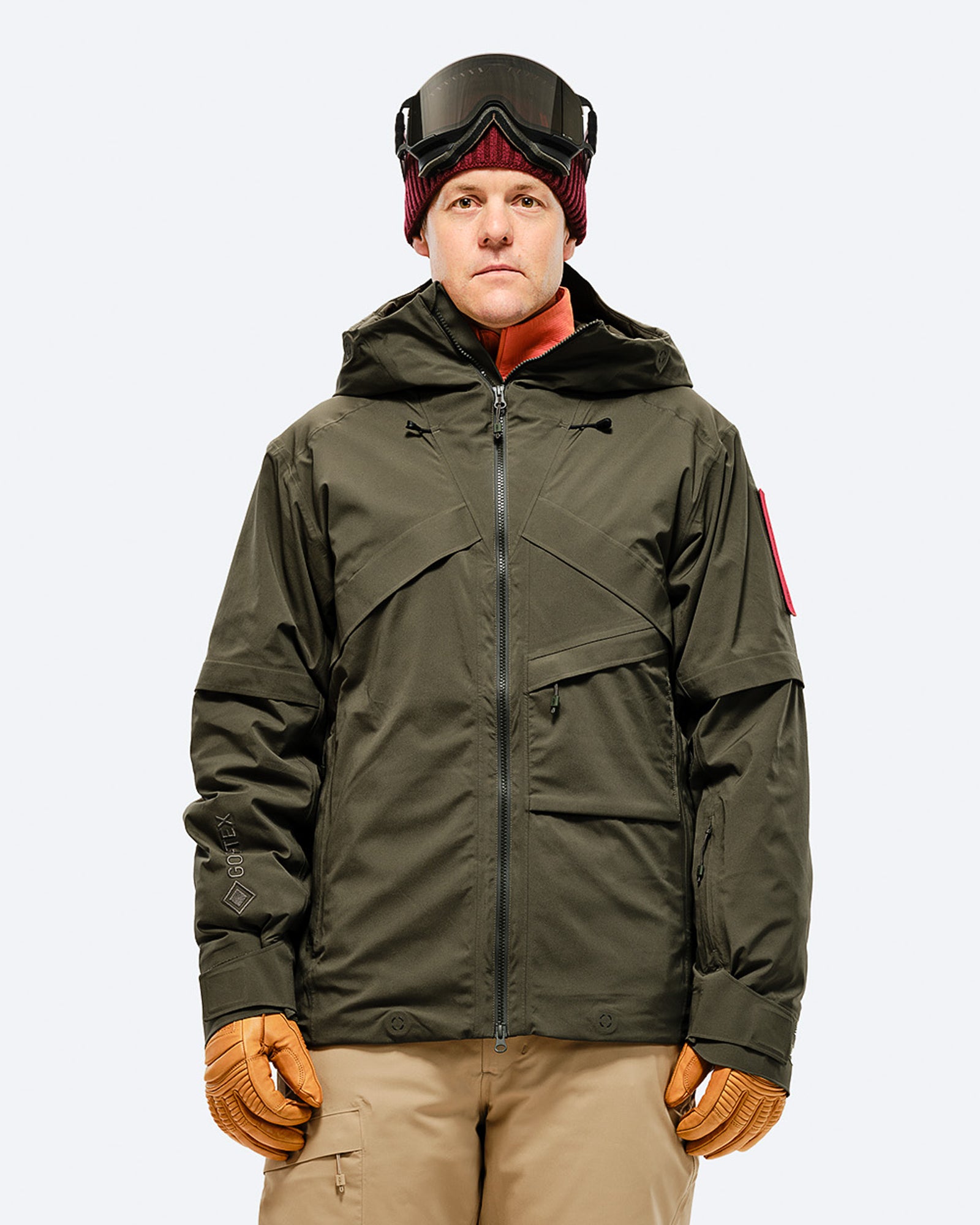 We Found Out What That Vertical Zippered Pocket on Your Favorite Outdoor  Jacket Is