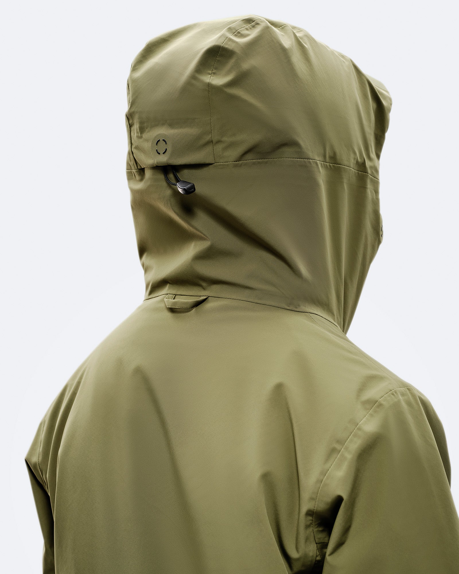 The 100 % seam taped ALP-3 stretch fabric provides 30 000 mm water pillar and 30000 g/m2/24h breathability, Adjustable, helmet compatible hood with laminated visor for optimal visibility in bad conditions, Coahesive cord stoppers. card image